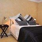 Room with double bed in the cottage.